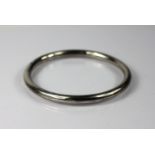 A silver slave bangle, Chester 1920, of