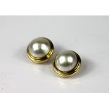 A pair of mabe pearl set clip earrings,