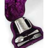 A cased silver christening set Josiah Wi