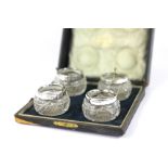 A cased set of four silver and glass sal