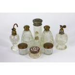 A collection of glass toilet jars, atomi