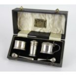 A cased silver condiment set, Charles S