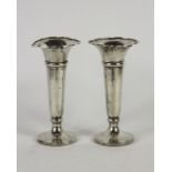 A pair of silver posy vases, Walker and