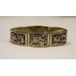 A Chinese silver bracelet, the six panel