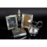 A silver hip flask, London 1911 of conca