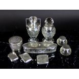 A collection of silver mounted jars, to