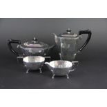 A silver four piece tea service, Francis Howard Ltd, Sheffield 1973, each piece of canted