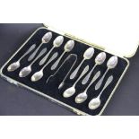 A cased set of twelve coffee spoons and sugar tongs, Gladwin Ltd, Sheffield, 6 x 1935 and 6 x 1927,