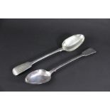 A silver fiddle pattern serving spoon Chawner & Co, London 1860, monogrammed 'B' with in a garter