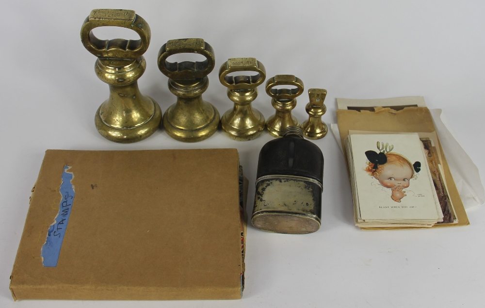 A graduated set of four Victorian brass weights, 7lb, 4lb, 2lb and 1lb, with an 8oz weight and