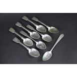 A collection of silver dessert spoons, to include; four fiddle pattern H J Lias & Son, London 1860,
