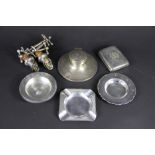A collection of silver wares, to include; A silver capstan inkwell (engraved) Birmingham 1911, base