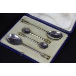 A cased set of four apostle and seal top spoons, to include; two seal top spoons by Francis Higgins