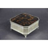 An Art Deco silver and simulated tortoiseshell jewellery box, with canted corners,