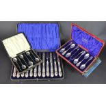 A cased set of Edwardian silver handled fruit knives and forks, George Henry Biggin Sheffield 1905,