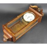 A Comitti of London walnut wall clock,