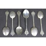 A set of six Britannia standard silver lace back tea spoons, with dog nose terminals,