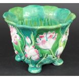 A 19th century Minton Majolica jardiniere, moulded with water lilies, impressed marks,