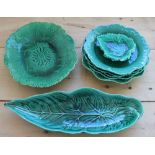 A collection of Wedgwood green glazed majolica leaf dishes, to include; four plates,