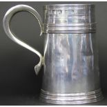 A Queen Anne silver mug or tankard, Richard Freeman, Exeter 1705, of tapering cylindrical form and