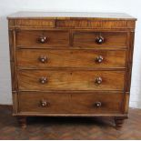 A William IV Mahogany chest, of two short and three long drawers on turned feet,