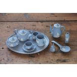 A Wedgwood blue jasper cameo ware miniature tea and coffee service and other miniature wares,