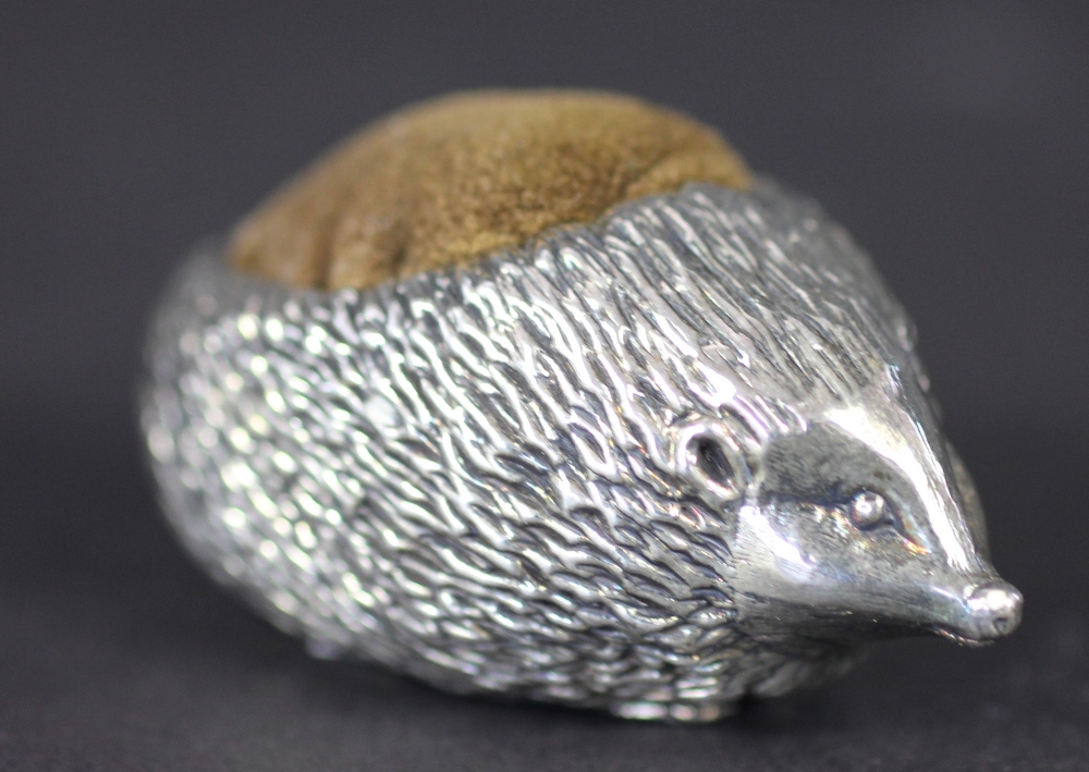 A silver hedgehog pin cushion, Ammonite Ltd, Birmingham 1982, 5.