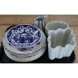 A Meissen acanthus leaf moulded blue and white plate; a Shelley jelly mould,