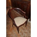 An Edwardian mahogany tub chair,