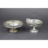 A silver swing handled bowl, Samuel M Levi, Birmingham 1908, of pierced pedestal form, 10.