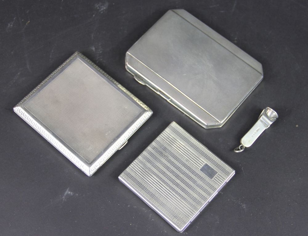 Two silver cigarette cases,