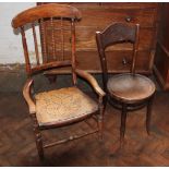 A late 19th century stained beech chair,