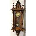 A late 19th century walnut and beech Vienna regulator,