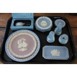 A collection of Wedgwood blue jasper cameo wares,