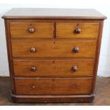 A Victorian mahogany chest, of two short and three long drawers on plinth base,