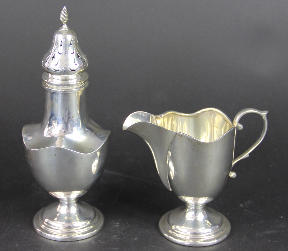 A silver sugar caster and cream jug, S Blanckensee & Sons Ltd, Birmingham 1931,