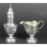 A silver sugar caster and cream jug, S Blanckensee & Sons Ltd, Birmingham 1931,
