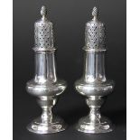 A pair of silver pepperettes C.