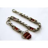 An agate set white metal Albert chain,