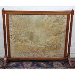 An early Victorian mahogany fire screen,