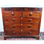 An early 19th century mahogany chest, of two short and three long drawers, with bun handles,