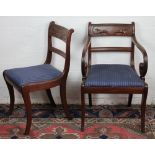 A set of six Regency mahogany dining chairs and one with arms,