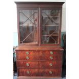 A late George III mahogany secretaire bookcase,