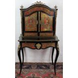 A 19th century French Boulle inlaid serpentine Bonheur de Jour, cut brass inlaid with tortoiseshell,