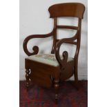 A Victorian mahogany commode chair,