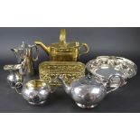 A silver plated circular basket with swing handle; a plated three piece tea set; a hot water pot;