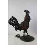 An Art Deco style French wrought iron and blown glass table lamp in the form of a Rooster,