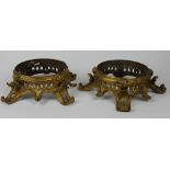 A pair of George III ormolu (mercury gilded bronze) vase stands,