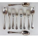 Six George V silver Old English Pattern table forks, and four table spoons with rat tail bowls,