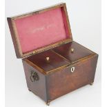 A Regency sarcophagus shaped mahogany tea caddy, two division, on brass ball toes, 20.